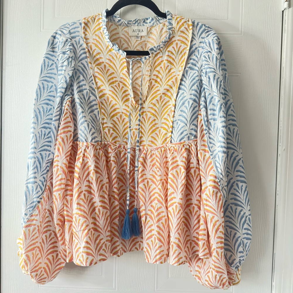 JUST STOPPING BY SPICED CORAL MULTI PRINT TOP
Red Dress Boutique